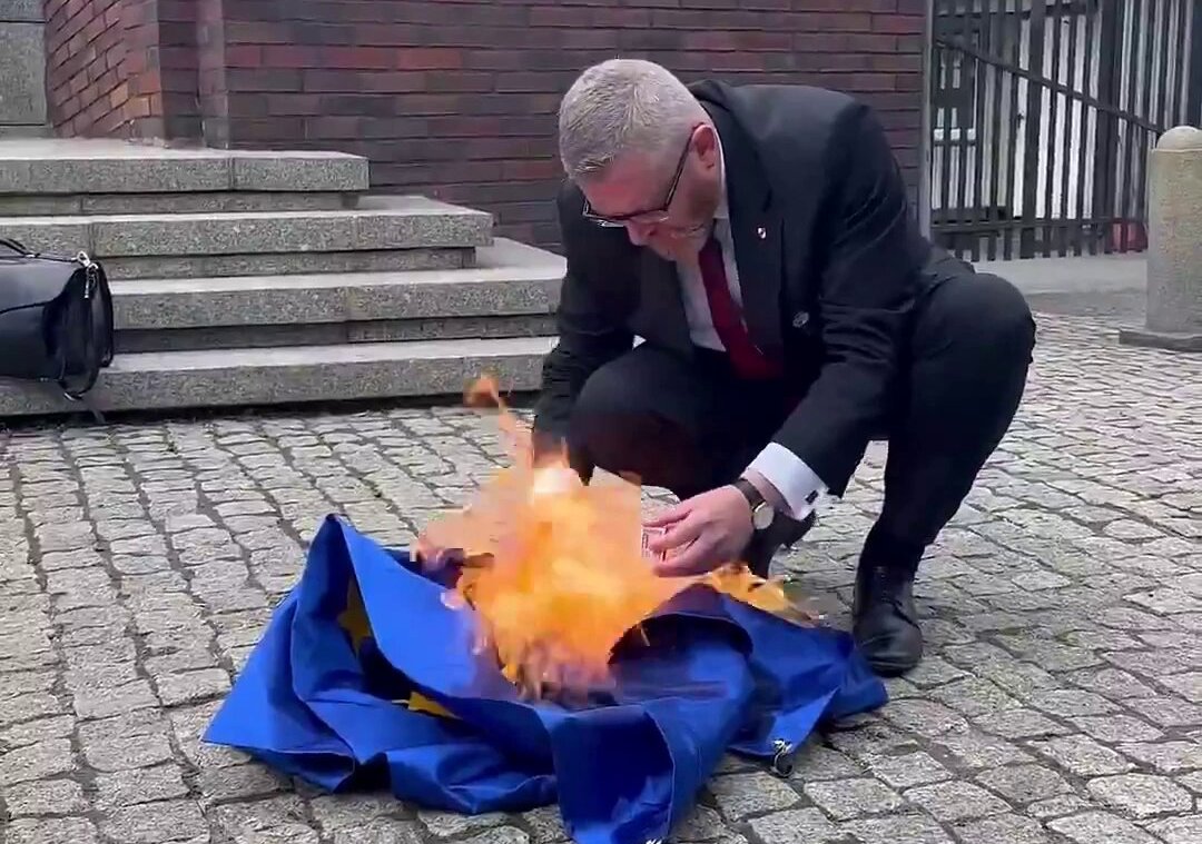 Polish Politician Grzegorz Braun Tore Down the European Union Flag, Wiped His Shoes With It, and Burned It